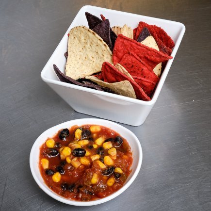 Black Bean And Corn Salsa With Tri-Colored Tortilla Chips.